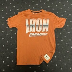 Under armour light orange graphic short sleeve tee. Size Medium